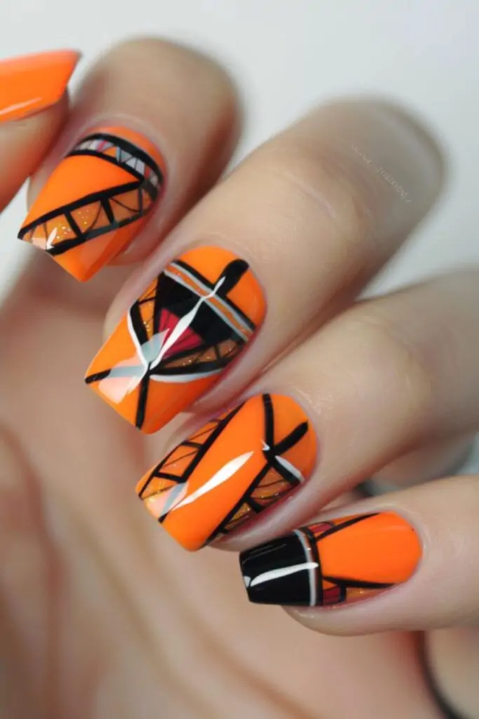 Orange Geometric Patterns Nail Design